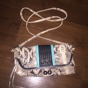 Snake print clutch with strap